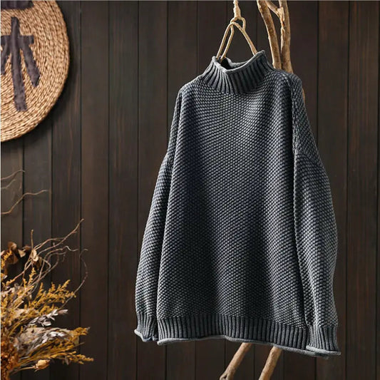 Pull col roulé en maille losange tridimensionnelle